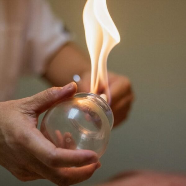 A flame inside a glass cup